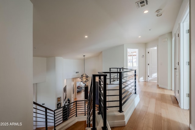 hall with light wood-type flooring