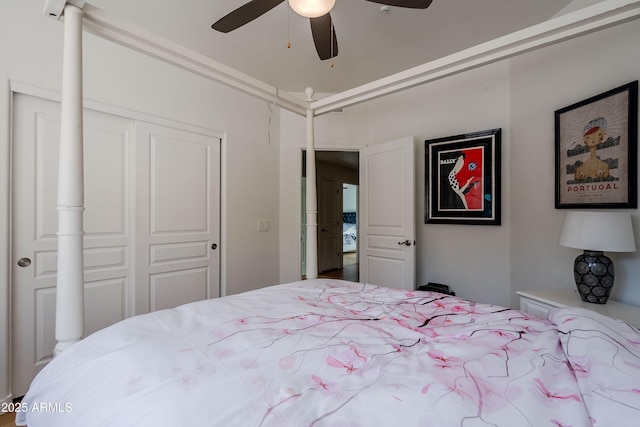 bedroom featuring ceiling fan and a closet