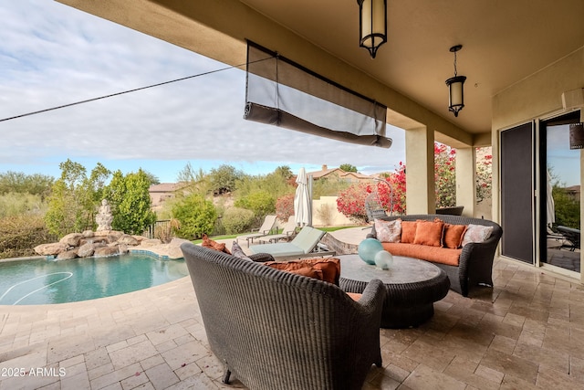 view of patio featuring outdoor lounge area and a fenced in pool