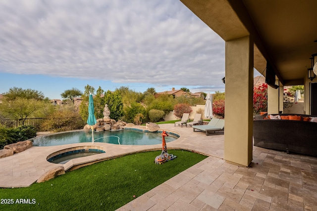 view of pool featuring an in ground hot tub, an outdoor living space, and a patio