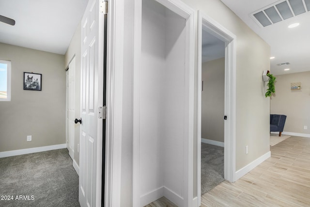 hall featuring light hardwood / wood-style flooring