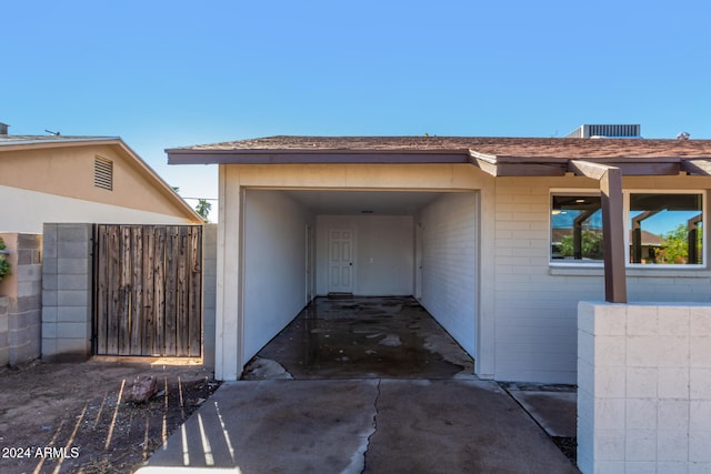 entrance to property with a carport