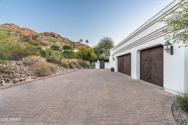 garage featuring a mountain view