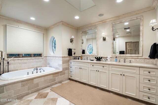 bathroom featuring vanity and separate shower and tub