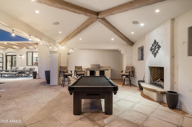 game room featuring vaulted ceiling with beams and pool table