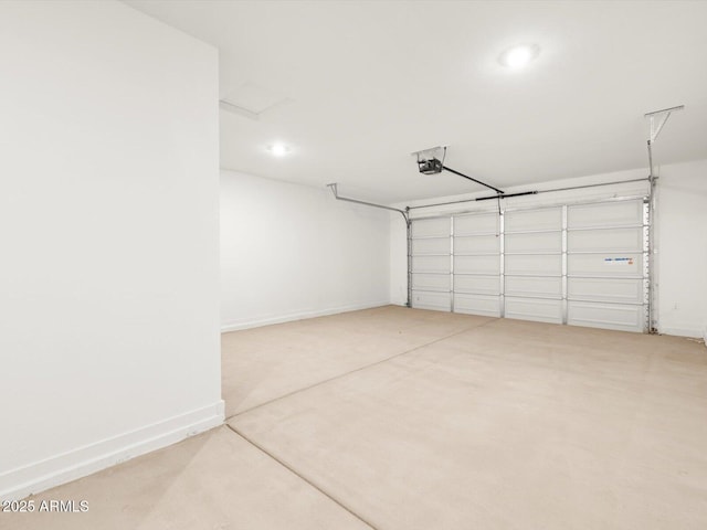 garage featuring baseboards, recessed lighting, and a garage door opener