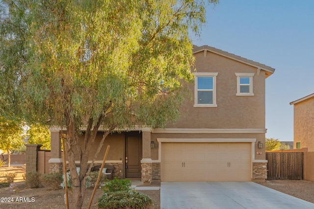 view of front of home with a garage