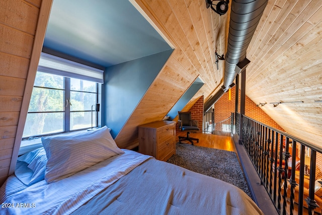 unfurnished bedroom featuring wooden walls, vaulted ceiling, and wood-type flooring