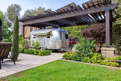 view of patio / terrace featuring a pergola