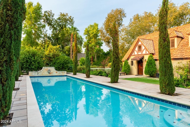 view of pool with a patio area