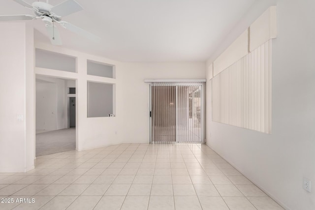 14609 W Black Gold Ln, Sun City West, AZ 85375 - spare room with a ceiling fan and light tile patterned floors