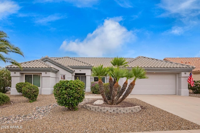 14609 W Black Gold Ln, Sun City West, AZ 85375 - mediterranean / spanish-style home with a tile roof, a garage, concrete driveway, and stucco siding