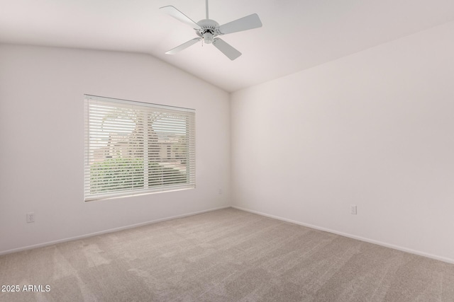 14609 W Black Gold Ln, Sun City West, AZ 85375 - carpeted spare room featuring vaulted ceiling, a ceiling fan, and baseboards