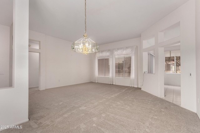 14609 W Black Gold Ln, Sun City West, AZ 85375 - carpeted empty room featuring a chandelier