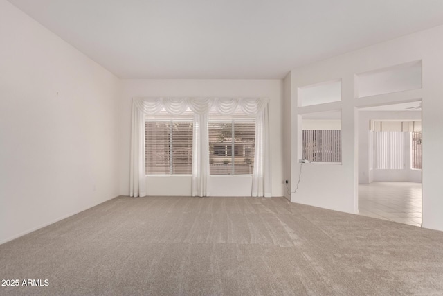14609 W Black Gold Ln, Sun City West, AZ 85375 - unfurnished room with carpet and plenty of natural light