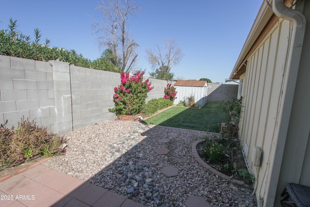 view of yard with a patio and a fenced backyard