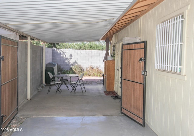 view of patio featuring outdoor dining area and a fenced backyard