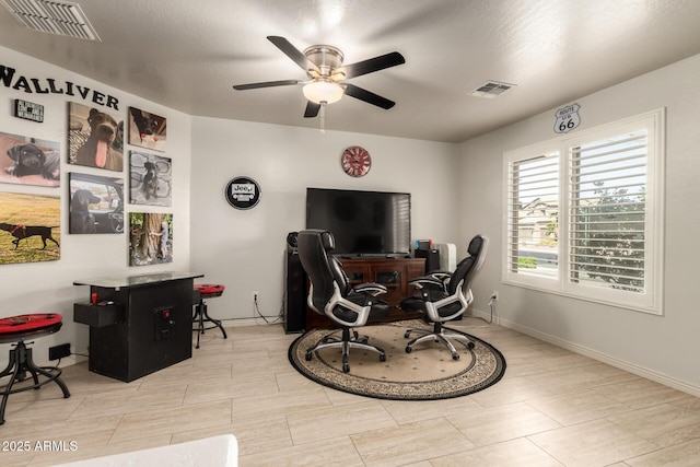 home office featuring ceiling fan