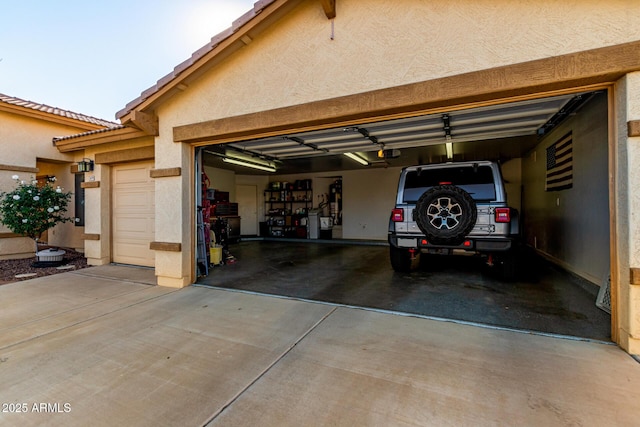 garage featuring a garage door opener