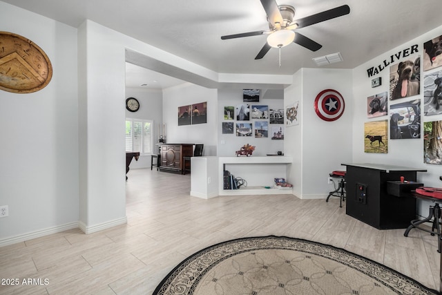 office space with ceiling fan