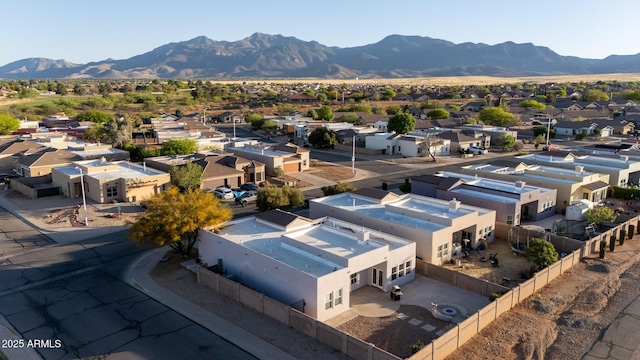 drone / aerial view featuring a mountain view and a residential view
