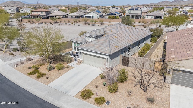 drone / aerial view with a mountain view and a residential view