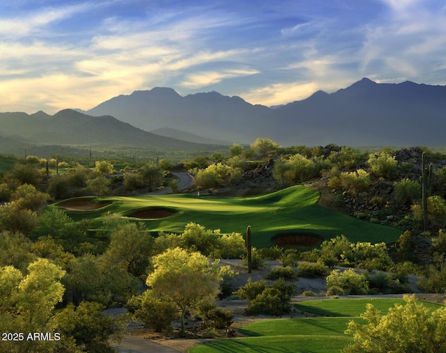 view of mountain feature with golf course view