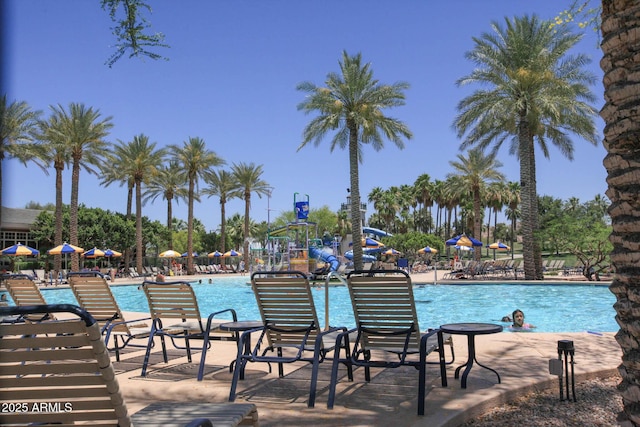 pool with a patio area