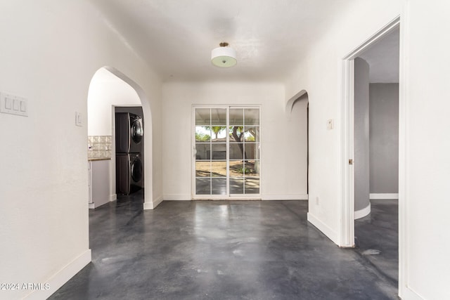 interior space with stacked washer / dryer