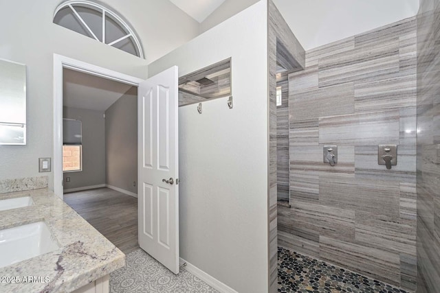 7949 W Wescott Dr, Glendale, AZ 85308 - full bath featuring a walk in shower, double vanity, and baseboards