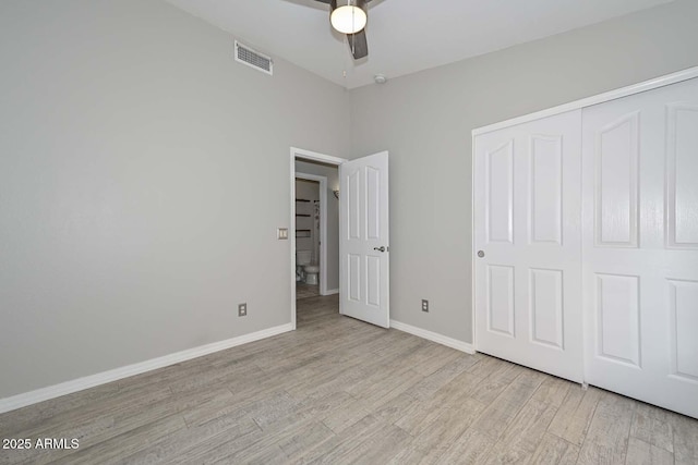 7949 W Wescott Dr, Glendale, AZ 85308 - unfurnished bedroom with light wood-style flooring, baseboards, a closet, and a ceiling fan