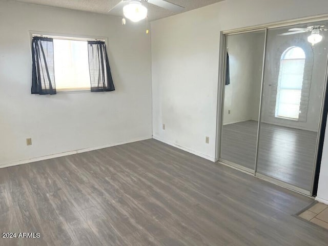 904 E Christmas Tree Ln, Pearce, AZ 85625 - spare room with a ceiling fan, wood finished floors, and baseboards