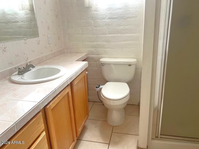 904 E Christmas Tree Ln, Pearce, AZ 85625 - full bathroom featuring a shower stall, vanity, tile patterned flooring, and toilet