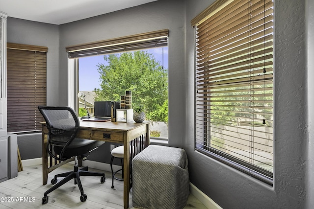 home office featuring baseboards