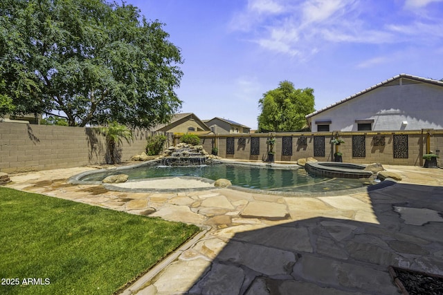 view of swimming pool featuring a patio, fence, and a pool with connected hot tub
