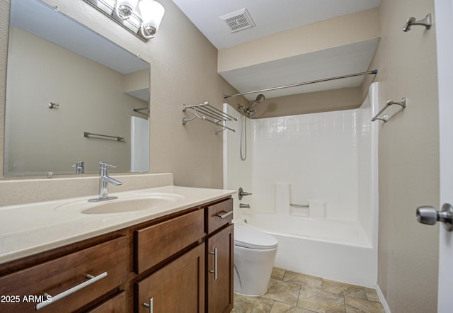 bathroom with toilet, tub / shower combination, vanity, and visible vents