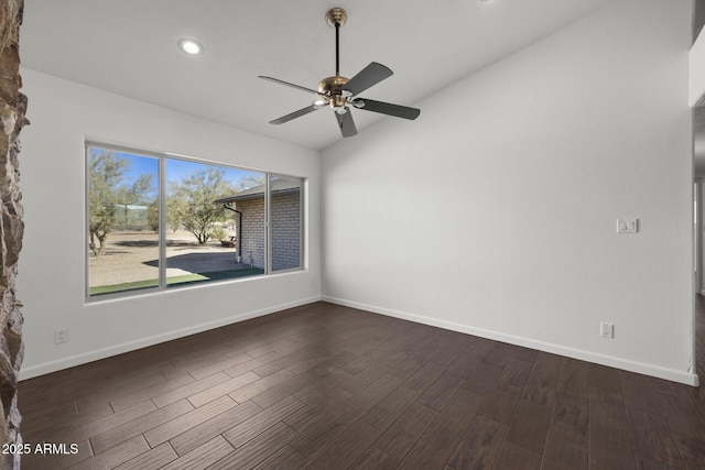 unfurnished room with ceiling fan and vaulted ceiling