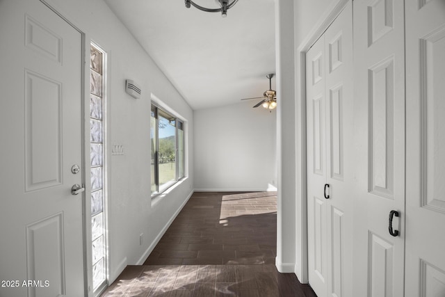 corridor with lofted ceiling