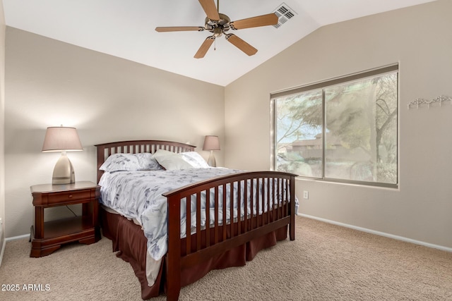 carpeted bedroom with ceiling fan and lofted ceiling