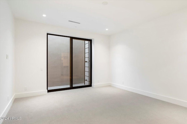 6921 N Joshua Tree Ct, Paradise Valley, AZ 85253 - carpeted empty room with baseboards and recessed lighting