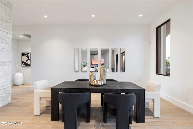 dining area with light wood-type flooring