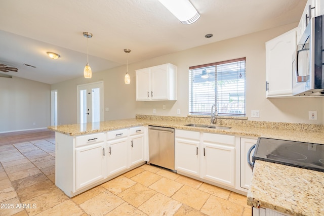 17824 E Chestnut Dr, Queen Creek, AZ 85142 - kitchen featuring stainless steel appliances, a peninsula, stone tile flooring, a sink, and visible vents