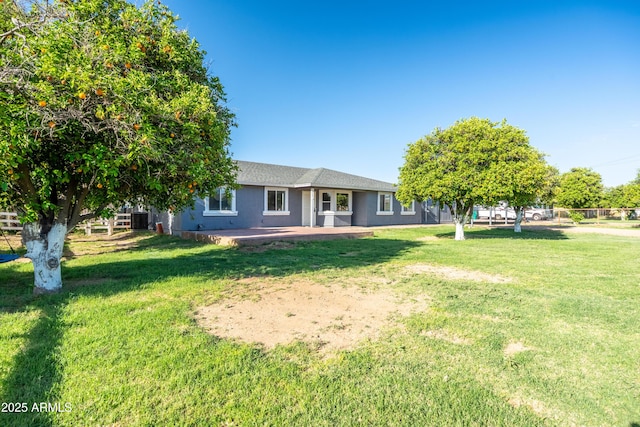 17824 E Chestnut Dr, Queen Creek, AZ 85142 - back of house with a lawn