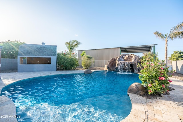 17824 E Chestnut Dr, Queen Creek, AZ 85142 - view of swimming pool with a fenced in pool, an outbuilding, a storage structure, and fence