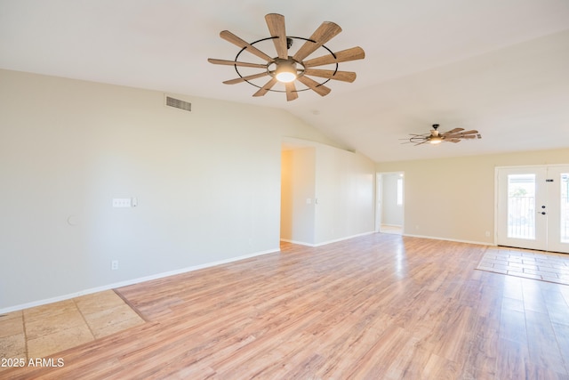 17824 E Chestnut Dr, Queen Creek, AZ 85142 - spare room with lofted ceiling, visible vents, light wood-type flooring, baseboards, and ceiling fan