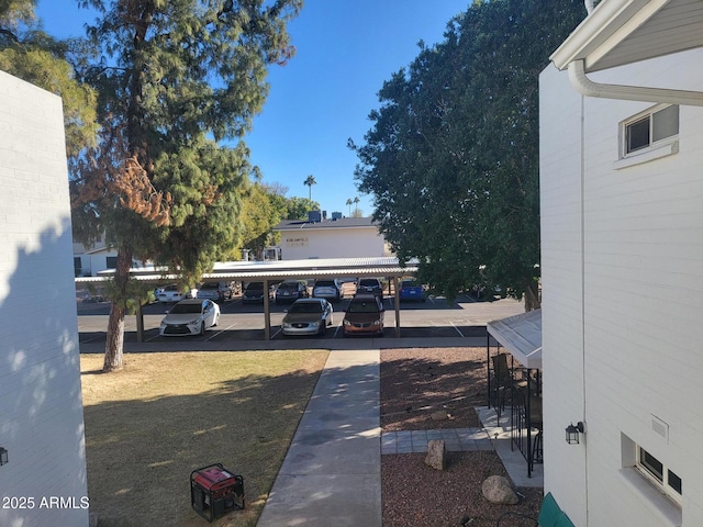 view of yard featuring a carport