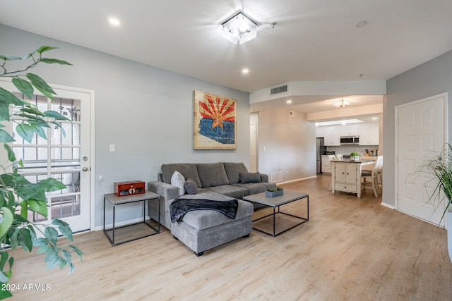 living room featuring light hardwood / wood-style floors