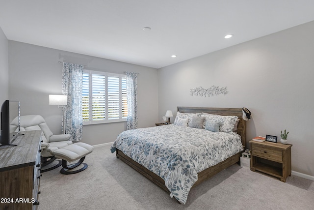 carpeted bedroom with baseboards and recessed lighting