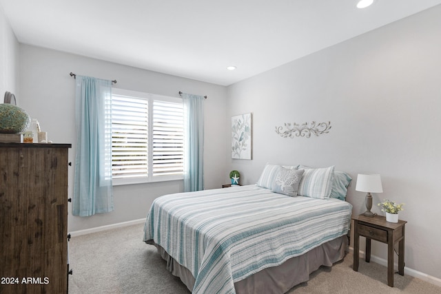 carpeted bedroom with recessed lighting and baseboards