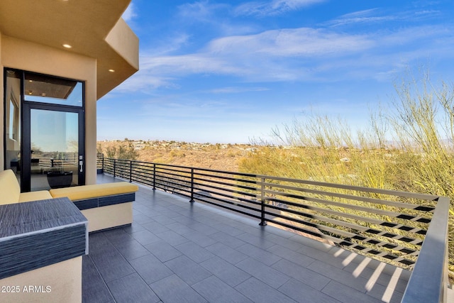 view of patio / terrace with a balcony